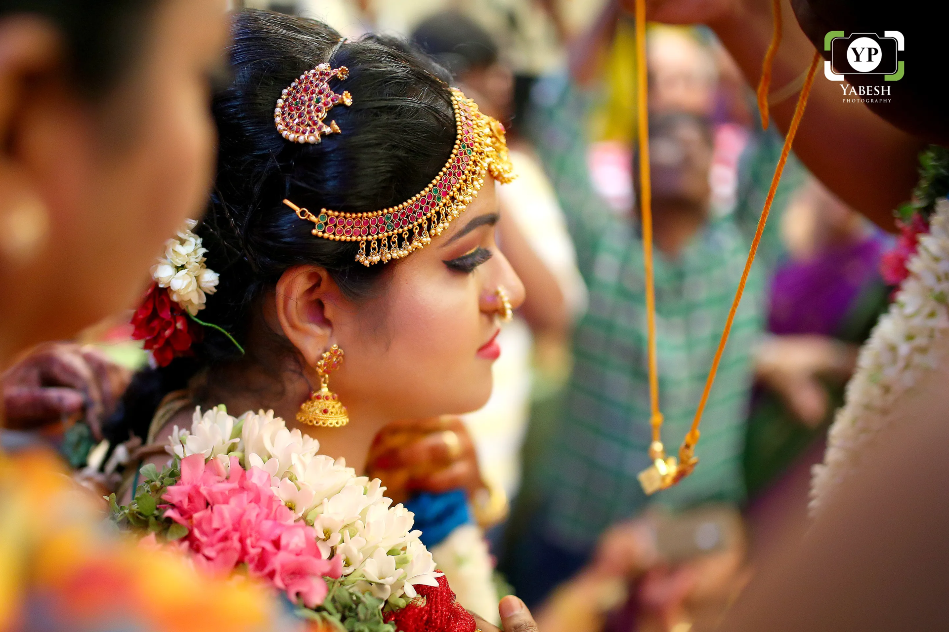 Elegant couple in traditional Brahmin wedding attire, captured by Yabesh Photography during a heartfelt ceremony